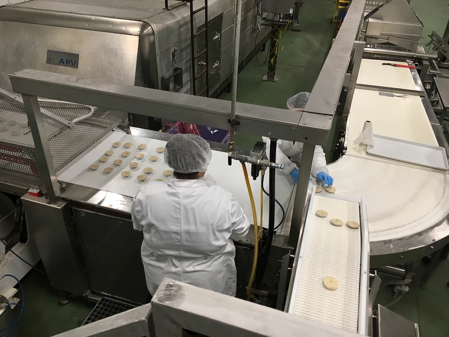 Worker in dehydration facility